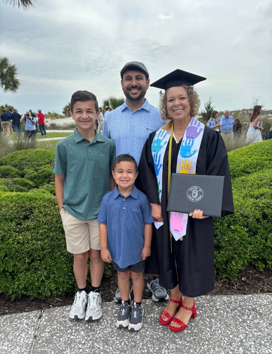 Family posing for picture